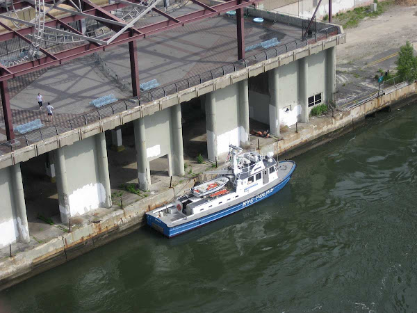 River Patrol - On the Manhattan shore, from the Queensboro Bridge.