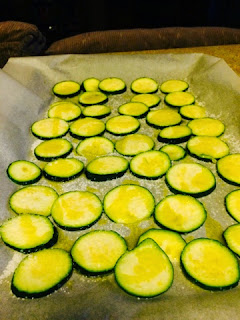 Sliced zucchinis ready for the oven