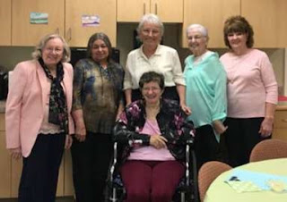 Behind Sue (seated), L to R: Alice Clack, Sue Bliven, Faith Flaherty, Carol Belcher, Pat Winiarski