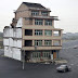 Motorway Built Around Couple's Home In China