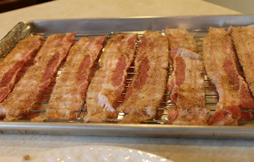 Bake your spice bacon on a rack in the oven.