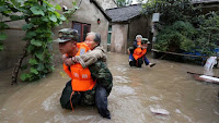 A 24-hour warning system of a coming storm or heat wave could reduce ensuing damage by 30%, according to a report by the Global Commission on Adaptation. (Photo Credit: Sino-German Urbanisation Partnership/Flickr) Click to Enlarge.