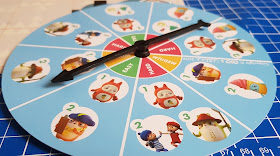 OKIDO Which Way Coding Game spinner showing segments with different pictures