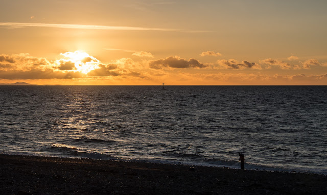 Photo of fishing as the sun sets