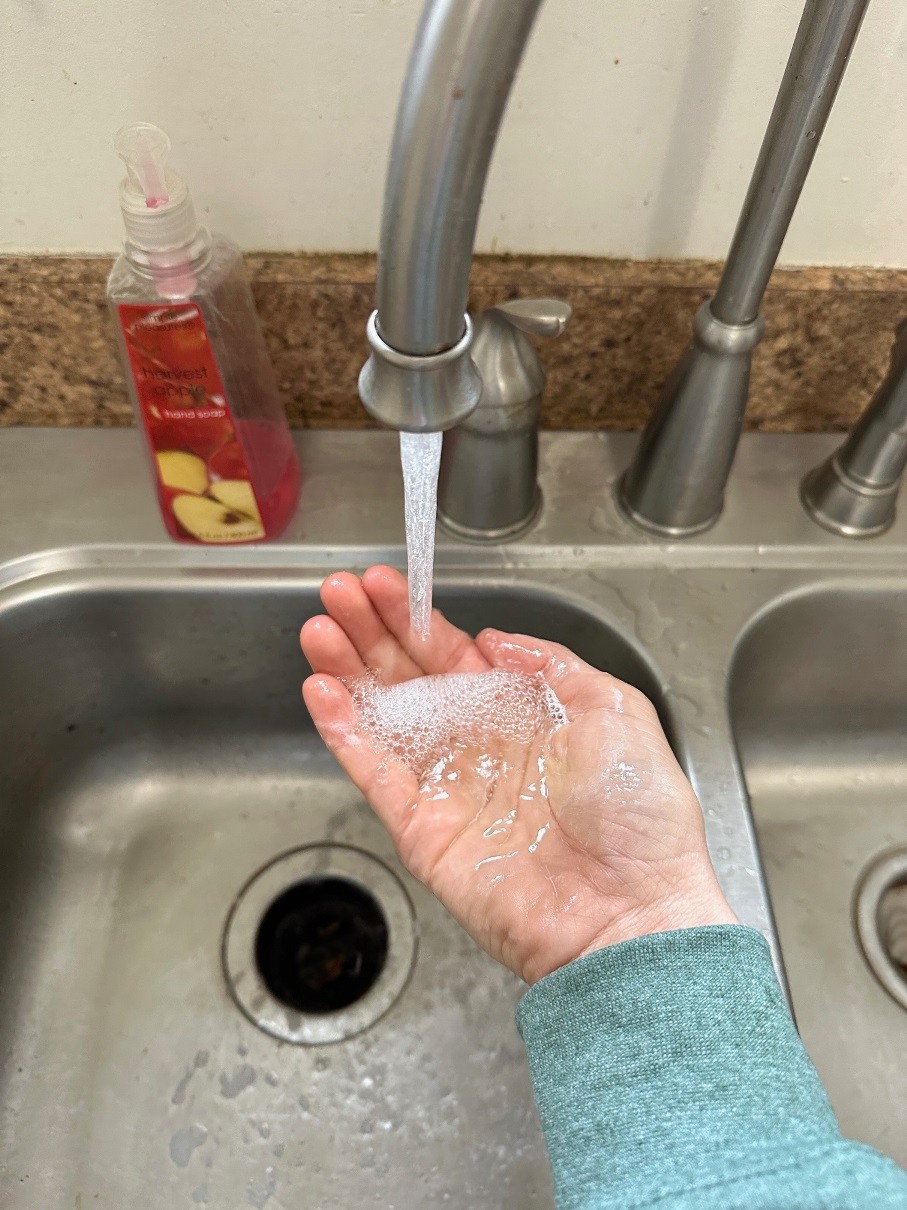 person washing hands