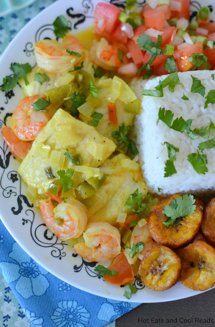 Colombian Fish and Shrimp in Coconut Sauce Recipe from Hot Eats and Cool Reads! This dinner recipe is so unique and flavorful! Best when served with chopped tomatoes and onions, fried plantains and rice!