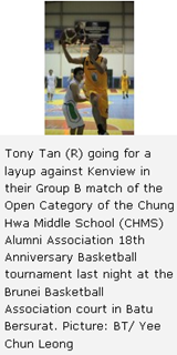 Tony Tan (R) going for a layup against Kenview in their Group B match of the Open Category of the Chung Hwa Middle School (CHMS) Alumni Association 18th Anniversary Basketball tournament last night at the Brunei Basketball Association court in Batu Bersurat. Picture: BT/ Yee Chun Leong 