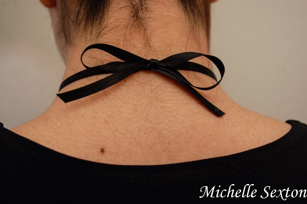 Tie a bow to wear this Safety Pin Bib Necklace