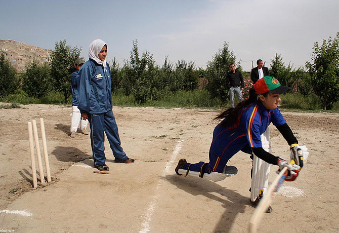 kabul girls soccer club. cricket team practices in