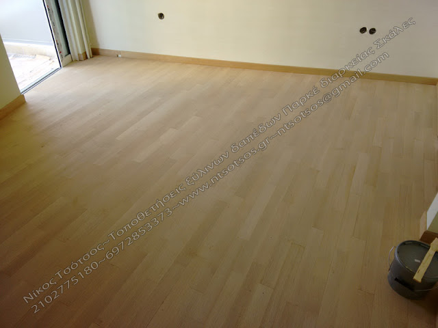 Τοποθετημένο ξύλινο πάτωμα χωρίς τρίψιμο και γυάλισμα
