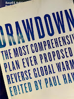 Drawdown, Edited by Paul Hawken, superimposed on Intermediate Physics for Medicine and Biology.