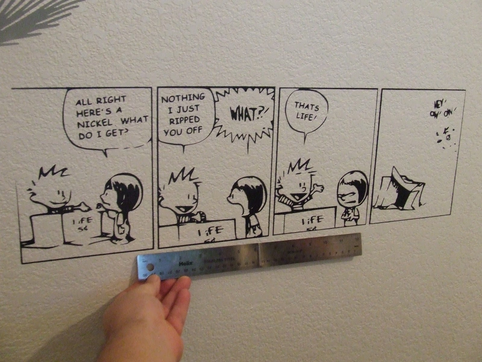 Wall decal of a Calvin and Hobbes Comic strip