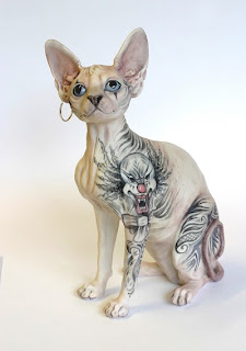 sphynx cat tattoo skin