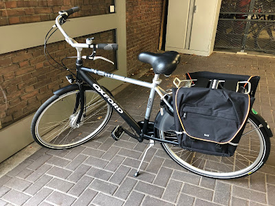 Rented bike with tow 20 L panniers on the back.