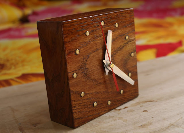 Clock finished with coffee and resin varnish