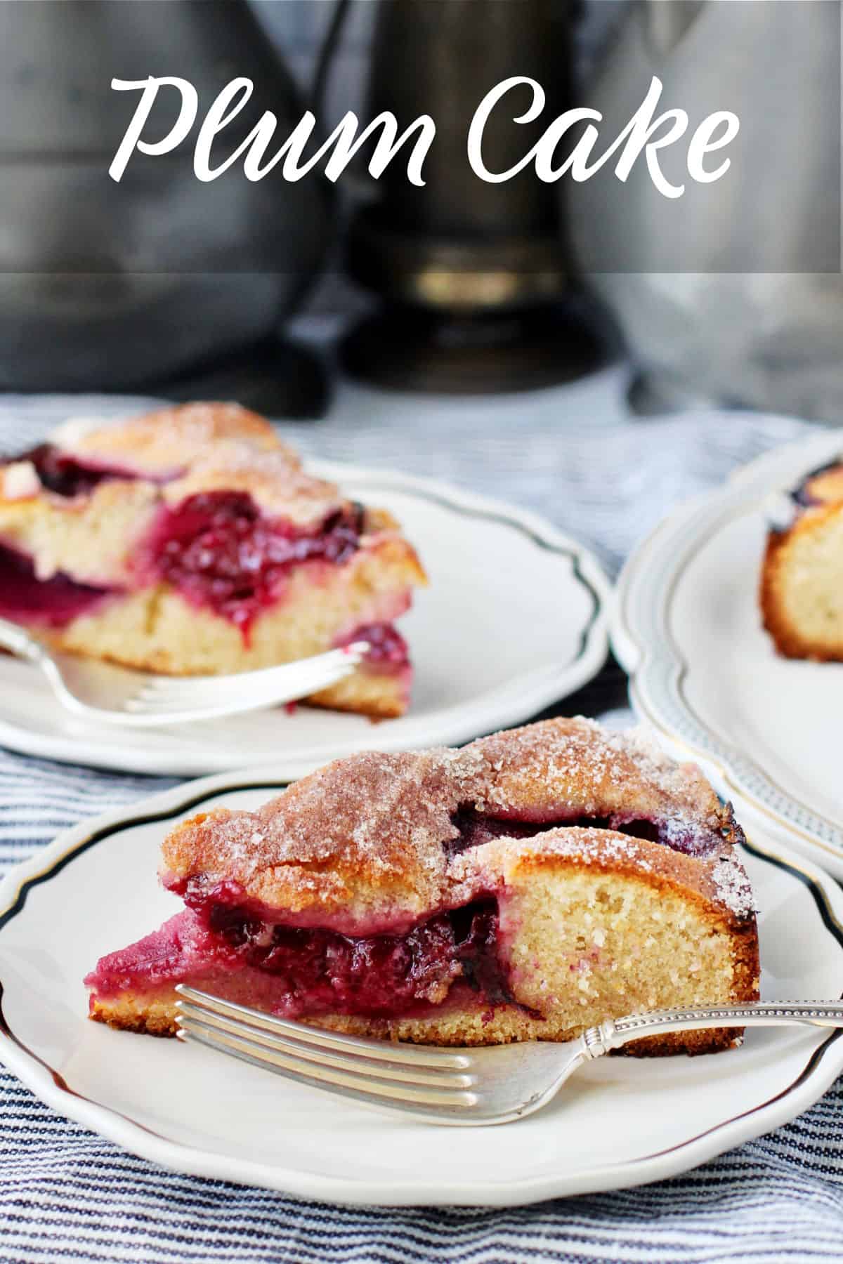 Plum Cake on plates with forks.