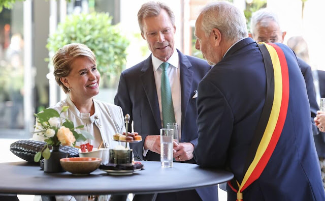Queen Mathilde wore a multi color silk top and skirt by Caroline Biss. Princess Sophie and Grand Duchess Maria Teresa