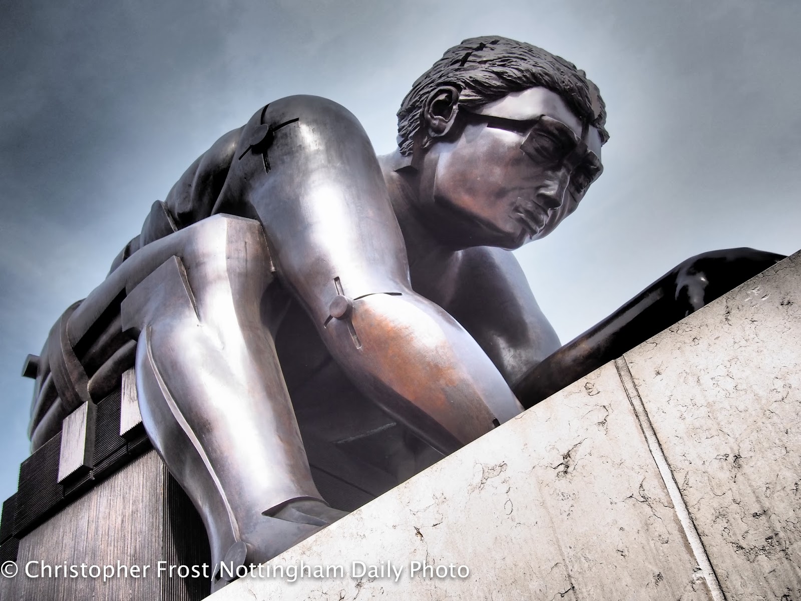 ... of this statue which stands (or sits) outside the British Library