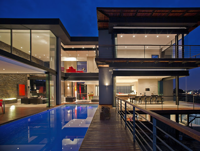 Picture of the pool area looking towards the house at sunset