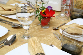 Fancy dinner at our house (no occasion :) ): golden table cloth and matching napkins set, flowers, wine goblets, silverware and good disposition :: All Pretty Things