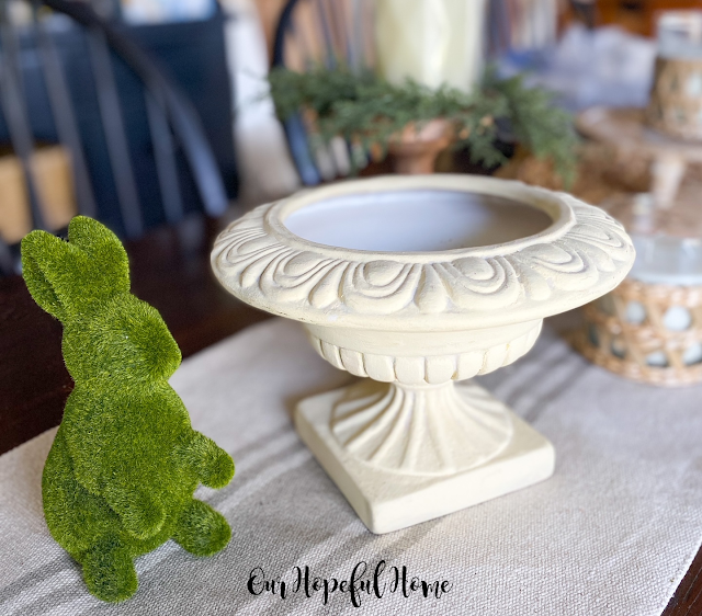 thrifted ceramic urn moss bunny table runner