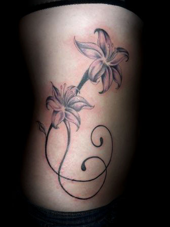 Side Tattoo Click here to see more Flower Tattoos and Tattoo Designs