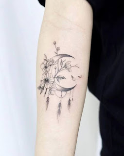 14 Stunning Simple Line Dreamcatcher Tattoo Designs On The Forearm