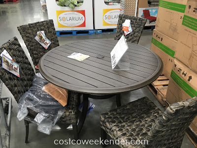 Enjoy the sun and chilling outside with the Woodard 5-piece Woven Dining Set