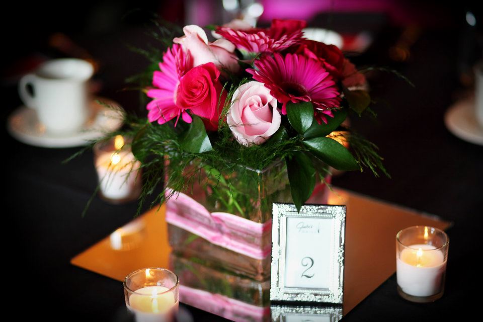 The Table Settings Having a mirror as part of the centerpiece is a classy