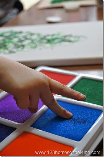 make lights using fingers and a stamp pad