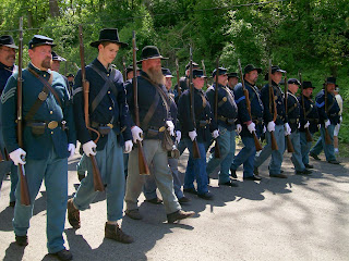 Reenactor soldiers marching in 150th Anniversary Lincoln Funeral Procession.