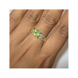 Surely, it looked more cute while the Thailand theme arranged their style for the ring finger of 62mm and the Pakistan culture furnishing the ornamental sector with Peridot stones. . . . .Yeah, it's making for an opulent high fashion touch.