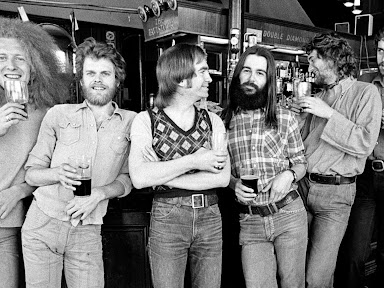 Average White Band black and white publicity photo at a bar