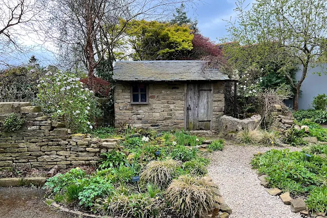 A display building and garden at Capel Manor Gardens