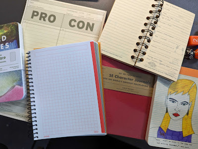A photograph of notebooks that have accumulated in my possession