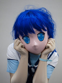 Doller in a blue wig.