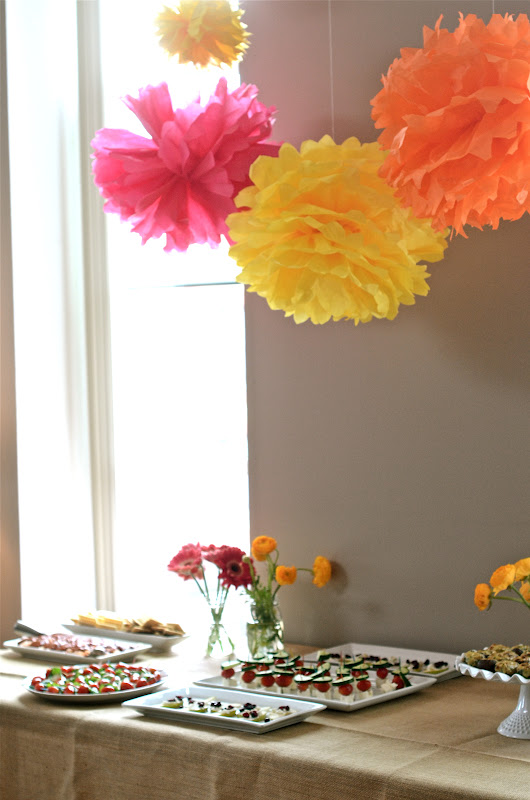  burlap table cloth with all white platters 