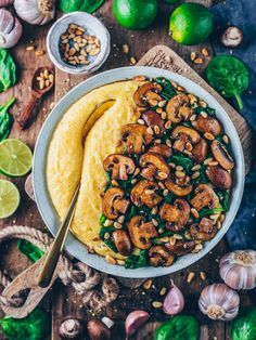This Creamy Vegan Polenta with Mushrooms, Spinach and Pine nuts makes an easy gluten-free lunch or dinner which is plant-based, healthy and ready in only 15 minutes. It's also perfect as side dish and you can serve it with any vegetables you like.