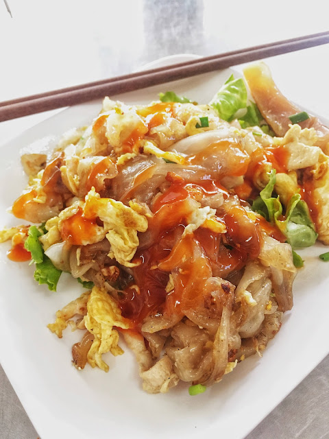 pad si ew with chili sauce in Bangkok, Thailand