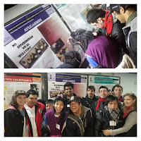 alumnos y docentes posando frente a su artículo