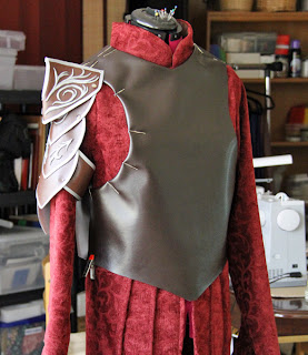 Preparing the armor vest of the Elrond costume.