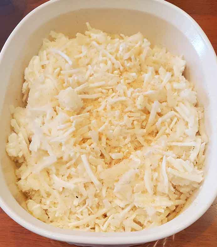 shredded hash browns in a casserole dish