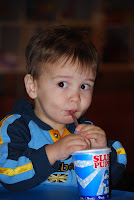 Tyler slurping his slush puppy