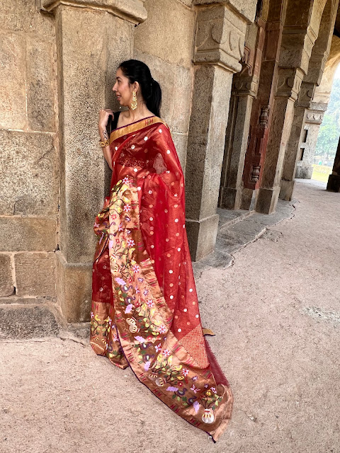 Double tissue kota doria saree with polka dots and jungle themed motifs