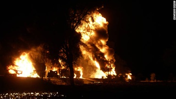 flames-rise-from-the-burning-nato-supply-oil-tankers-following-an-attack-by-gunmen-in-dadar-town-of-bolan-district-about-90-kilometres-southwest-of-quetta-the-provincial-capital-of-baluchistan