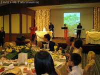 An image of the main table with the Jazz Band performing on stage