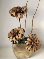 http://manualidadesparaninos.biz/flores-con-rollos-de-carton/