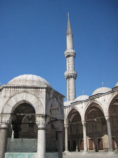 The courtyard and a minaret of the Blue Mosque.