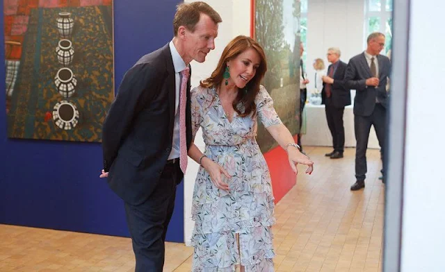 Princess Marie wore a ruffle floral-print crepe midi dress by Maje Paris. Prince Joachim also attended the reception