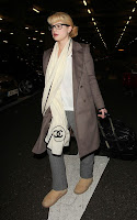 Kelly Osbourne Arrives at Heathrow Airport